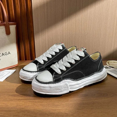 MAISON MIHARA YASUHIRO PETERSON OG SOLE CANVAS LOW BLACK